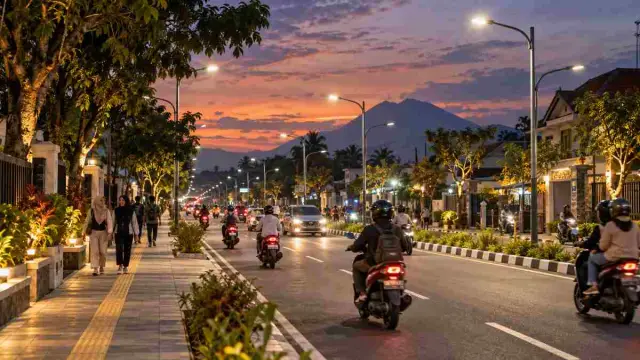 Ilustrasi jalan umum yang diterangi lampu pada malam hari